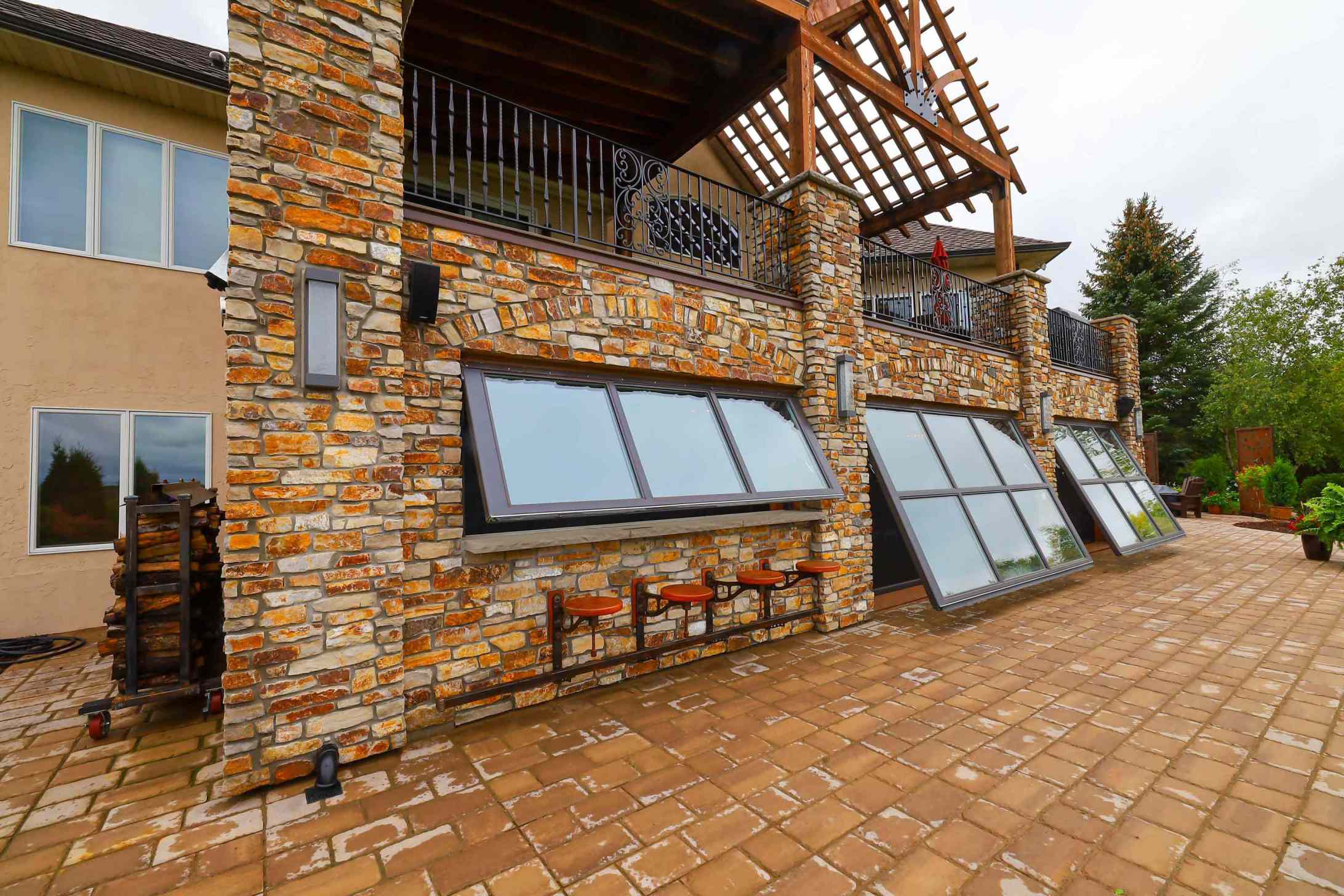 Golf Course home with 3 Powerlift Glass walls